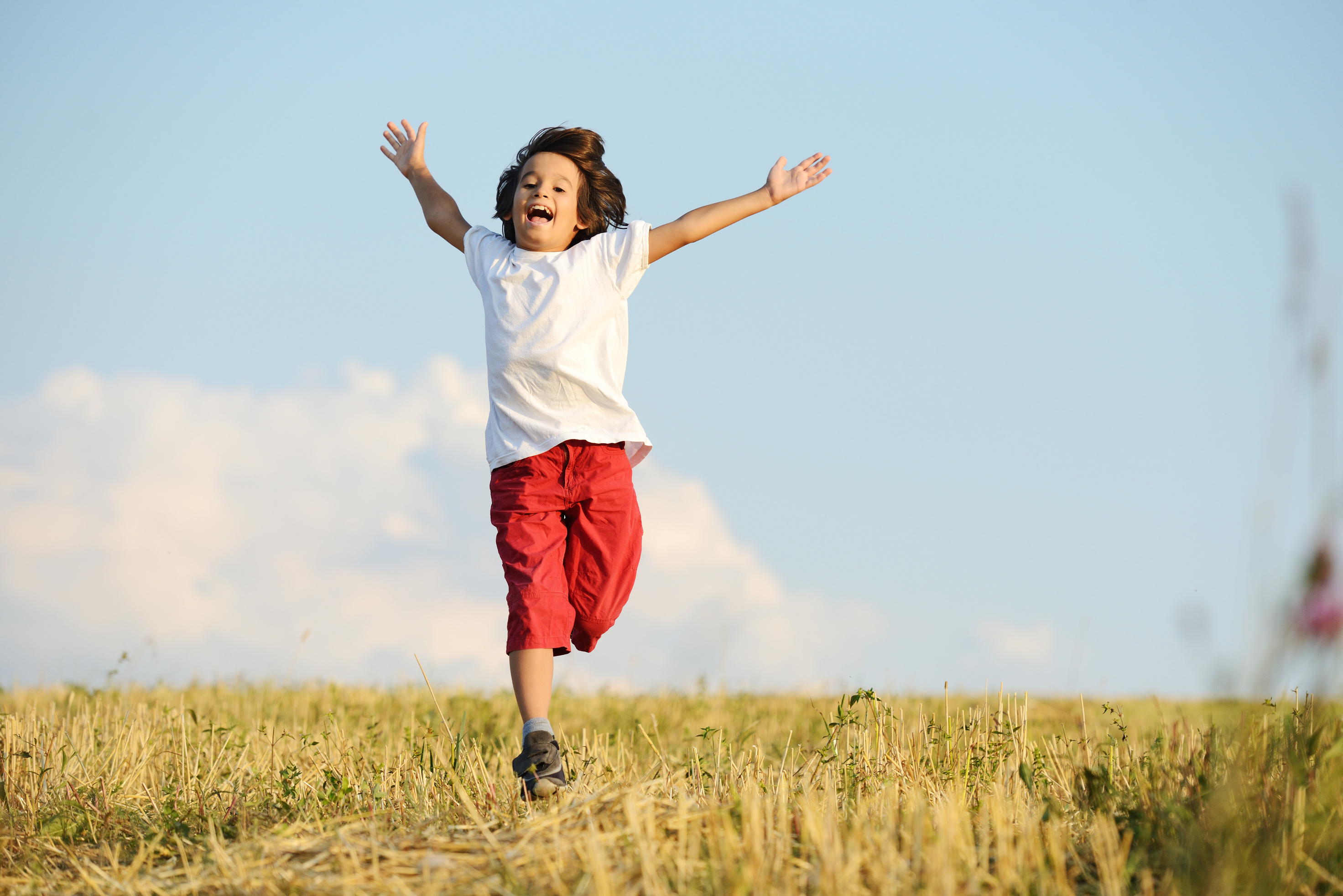 Child in Nature Running